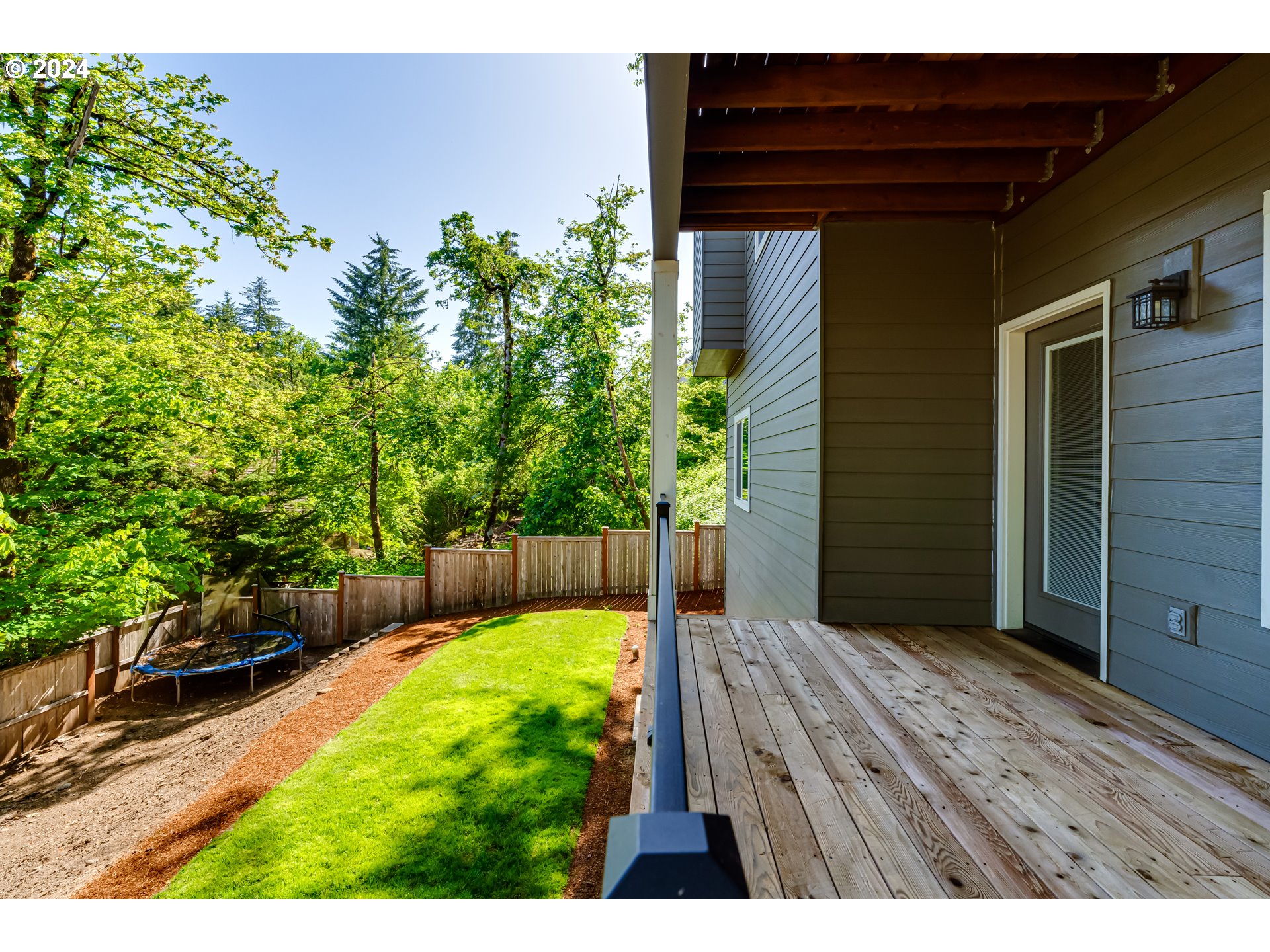 6362 Forest Ridge Drive Springfield, OR 97478 - Photo 42 of 44 a view of a backyard with potted plants