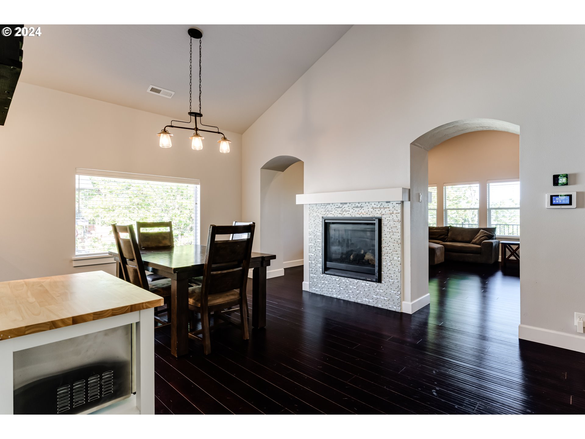 6362 Forest Ridge Drive Springfield, OR 97478 - Photo 6 of 44 a view of a dining room with furniture window and wooden floor