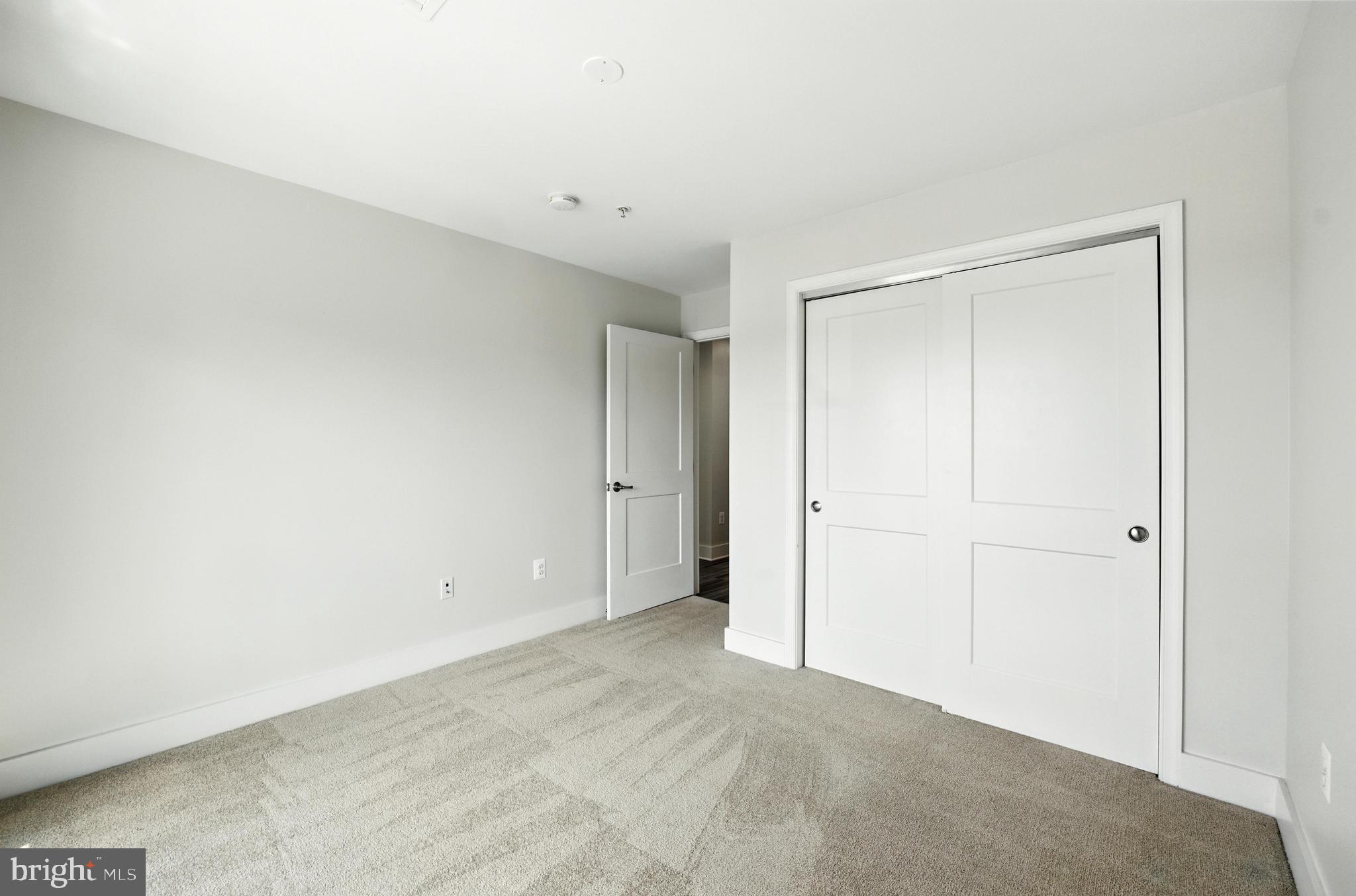 19510 Village Walk, Unit 2205 Montgomery Village, MD 20886 - Photo 15 of 21 a view of an empty room