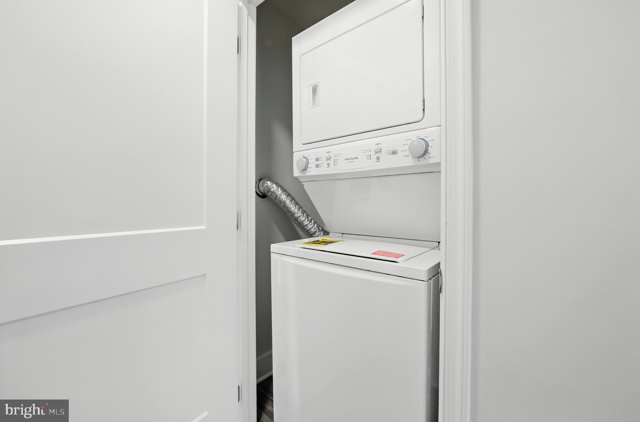 19510 Village Walk, Unit 2205 Montgomery Village, MD 20886 - Photo 21 of 21 a utility room with dryer and washer