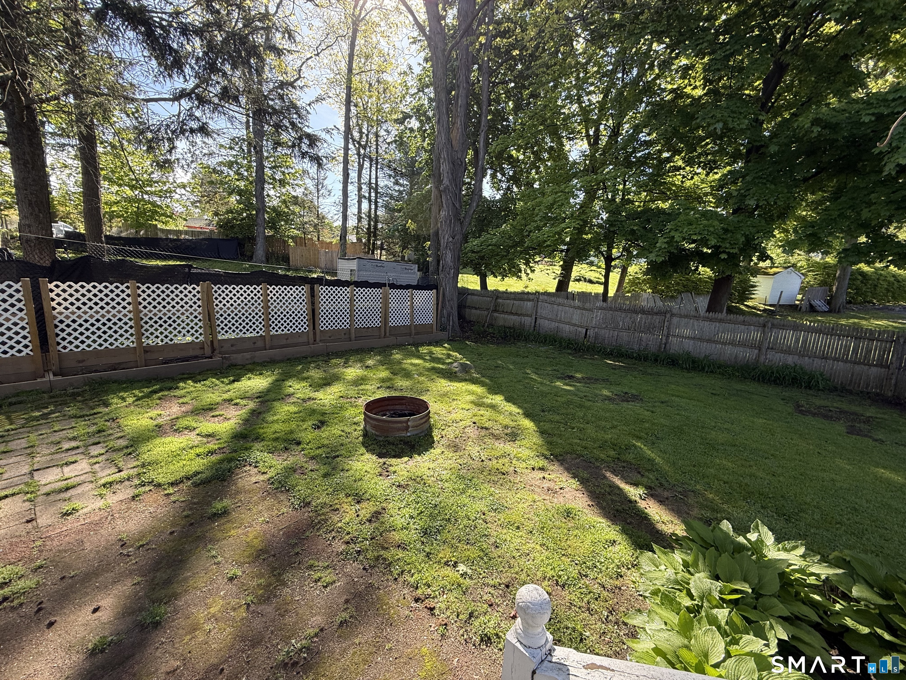 808 East Main Street Torrington, CT 06790 - Photo 10 of 40 a view of a backyard with a garden