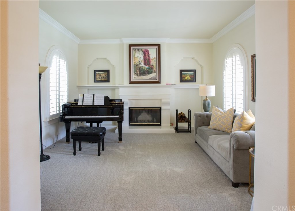 29 Marble Sands Newport Beach, CA 92660 - Photo 2 of 29 Formal living room with fireplace.