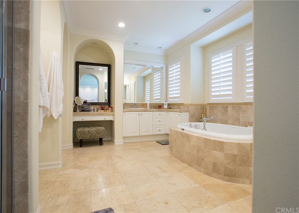 29 Marble Sands Newport Beach, CA 92660 - Photo 15 of 29 Master bath with soaking tub, separate shower, dual sinks and vanity.
