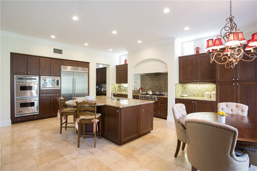 29 Marble Sands Newport Beach, CA 92660 - Photo 4 of 29 Spacious kitchen with double ovens, built-in microwave and refrigerator. Tons of storage with a butler's pantry too!