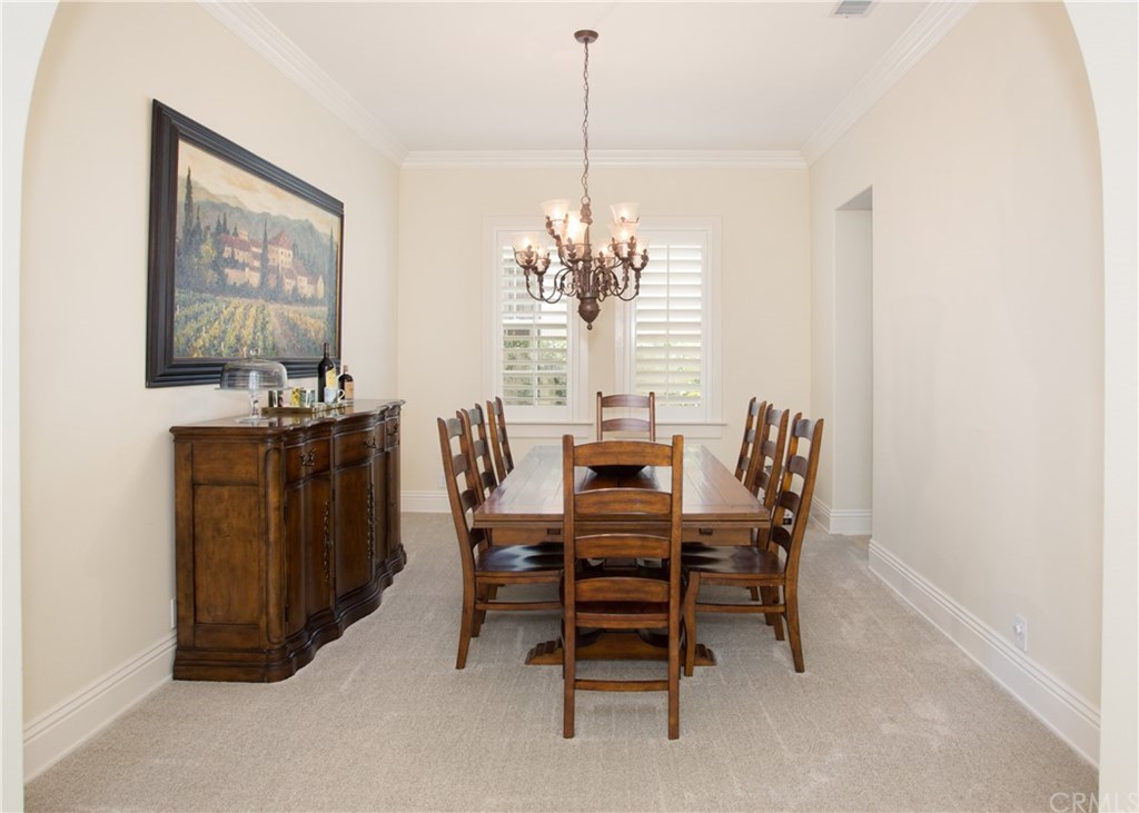 29 Marble Sands Newport Beach, CA 92660 - Photo 10 of 29 Formal dining room easily seats 8-10 guests.