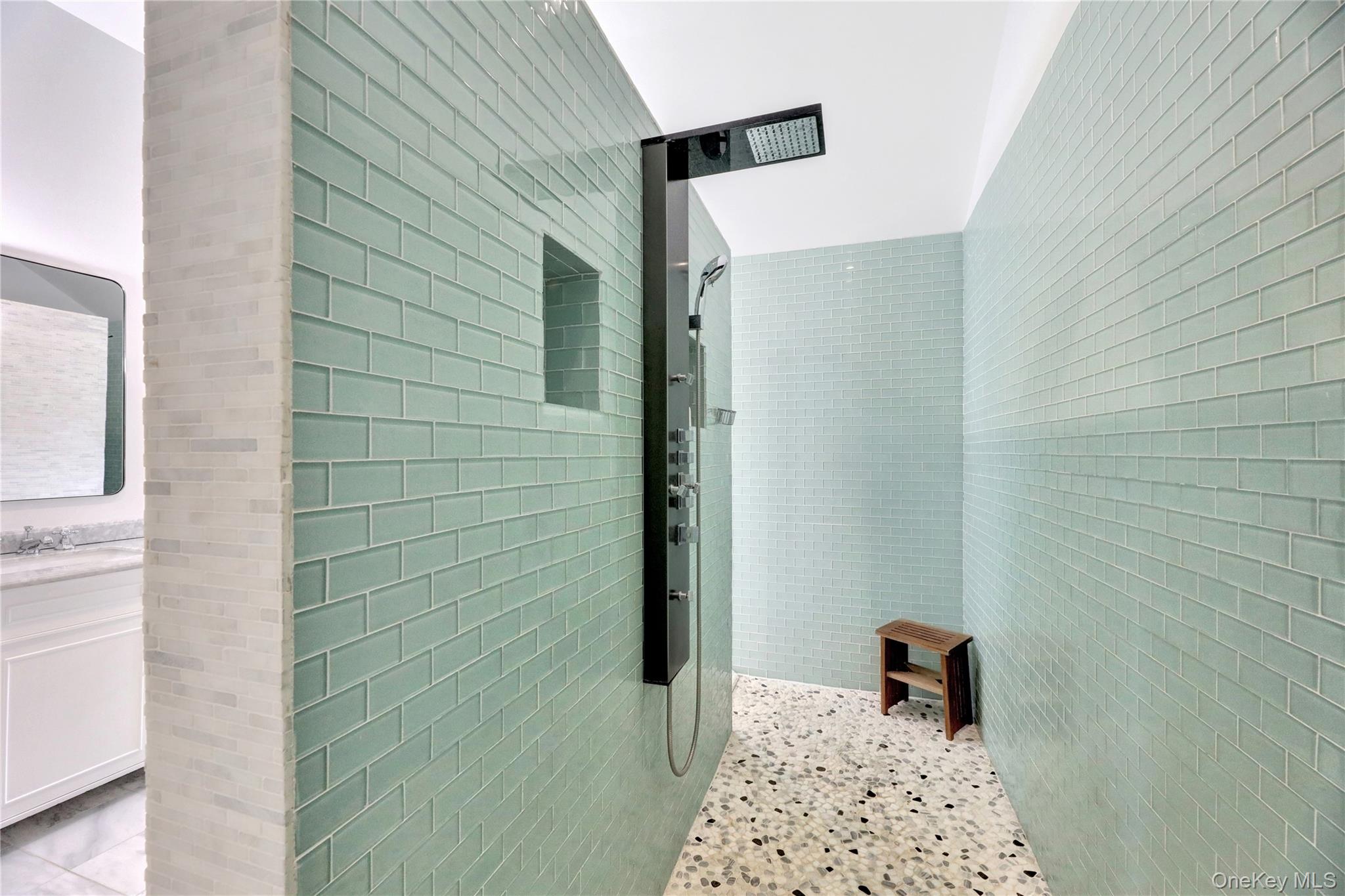 198 South Country Road Remsenburg, NY 11960 - Photo 26 of 49 a bathroom with a shower and a sink