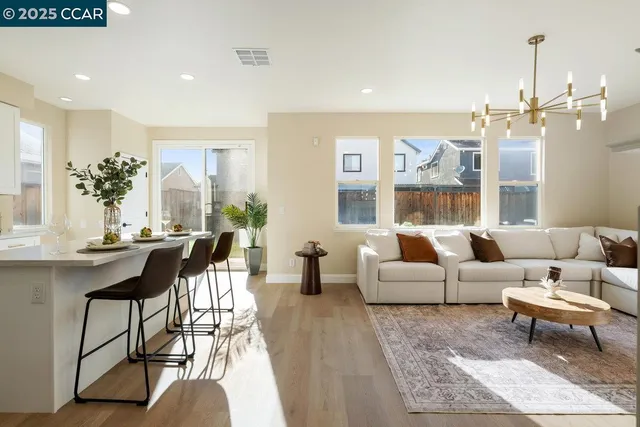 a living room with furniture and a table