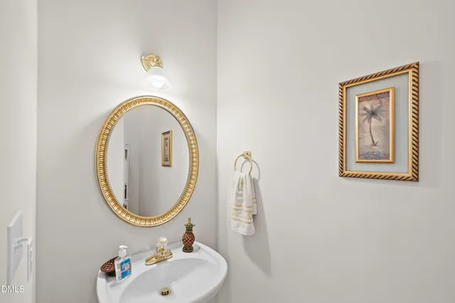 a kitchen with stainless steel appliances granite countertop a refrigerator stove microwave and sink