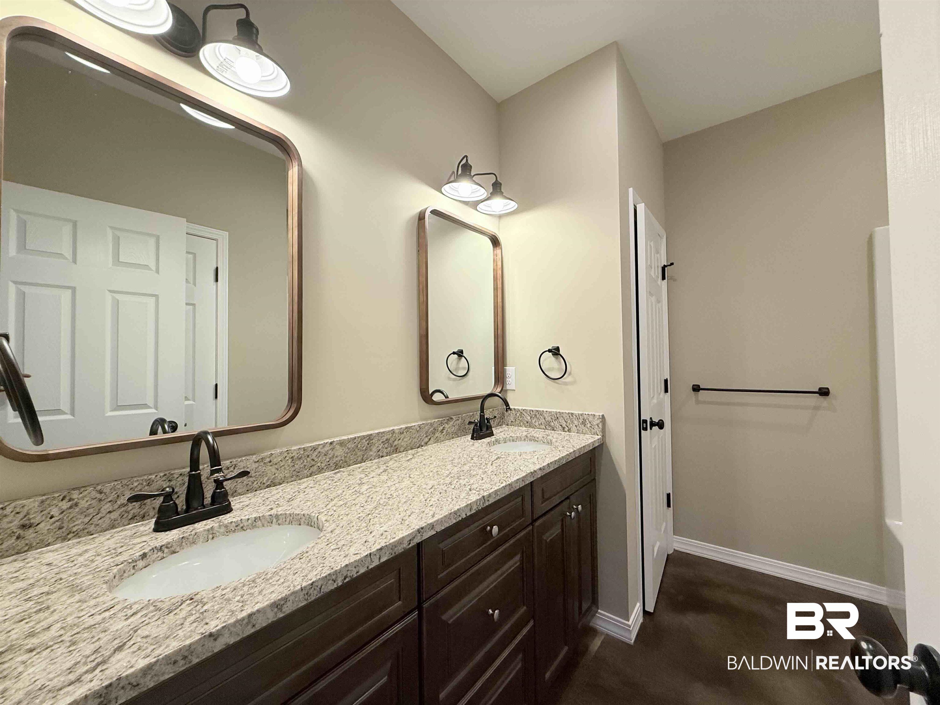 33071 -B Stables Drive, Unit B Daphne, AL 36527 - Photo 11 of 13 Full bathroom featuring double vanity and baseboards