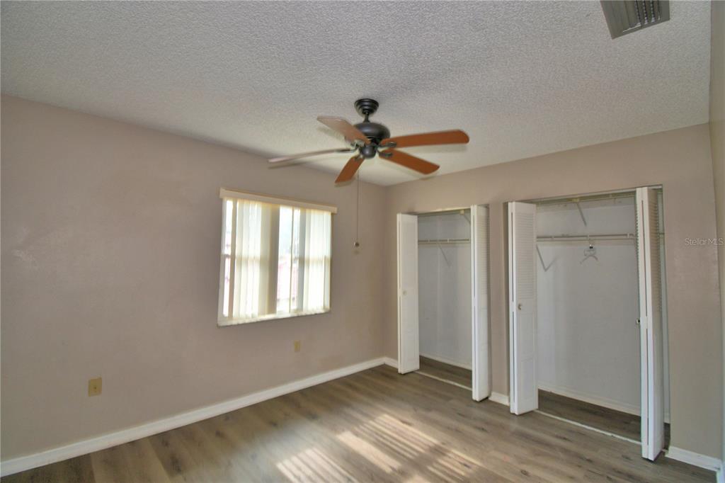 573 Hunter Circle Kissimmee, FL 34758 - Photo 29 of 36 a view of an empty room with a window