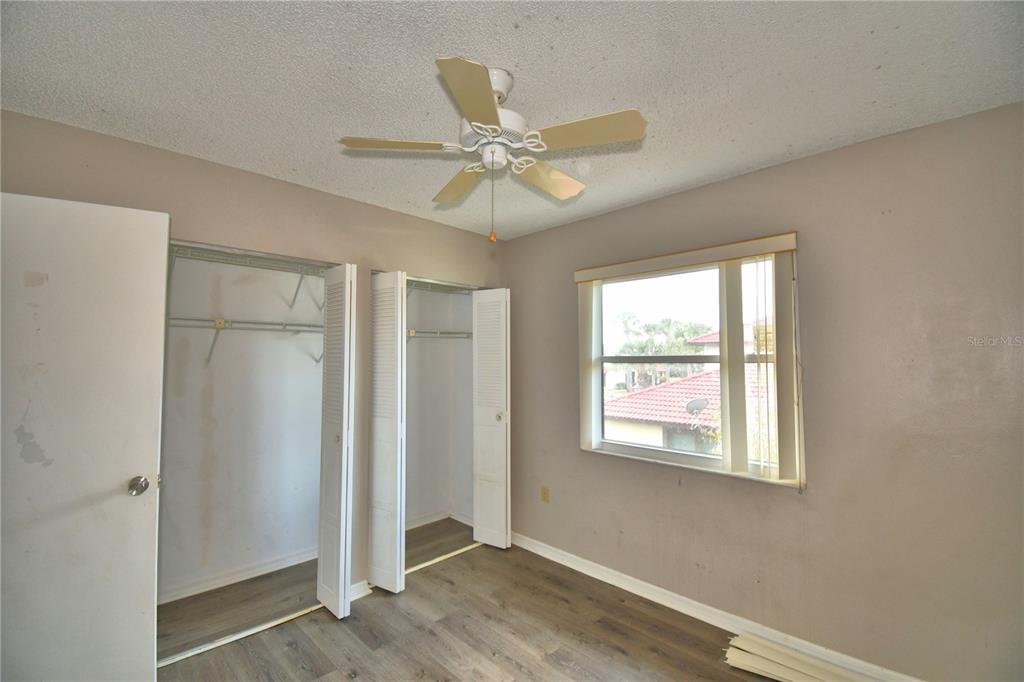 573 Hunter Circle Kissimmee, FL 34758 - Photo 30 of 36 a view of an empty room with a window