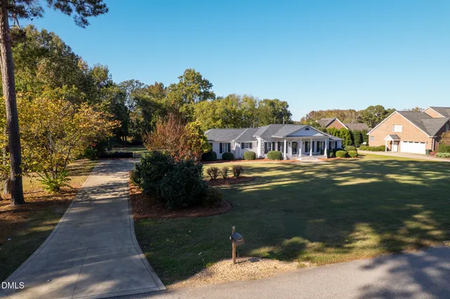 a view of house with garden space