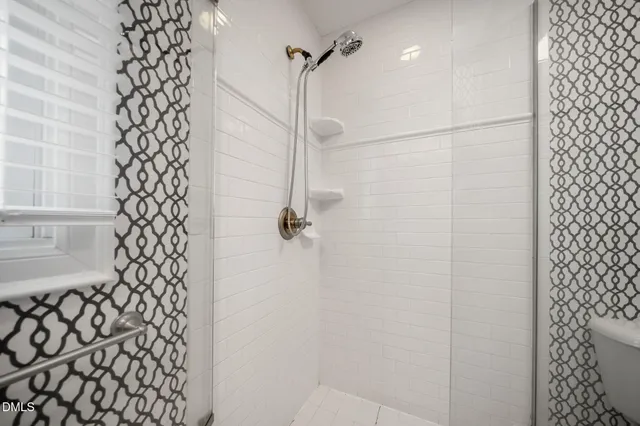 a bathroom with a shower curtain