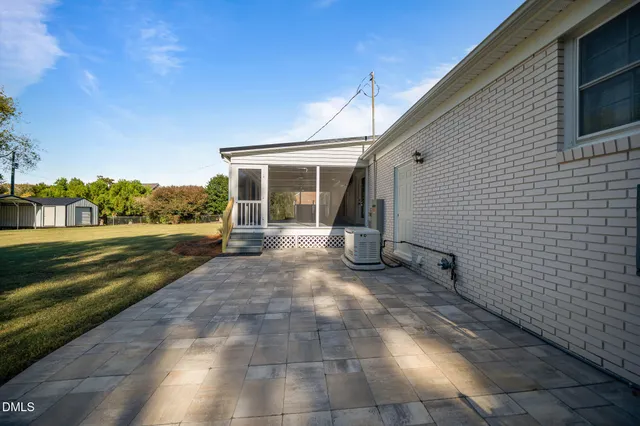 aerial view of a house with garden