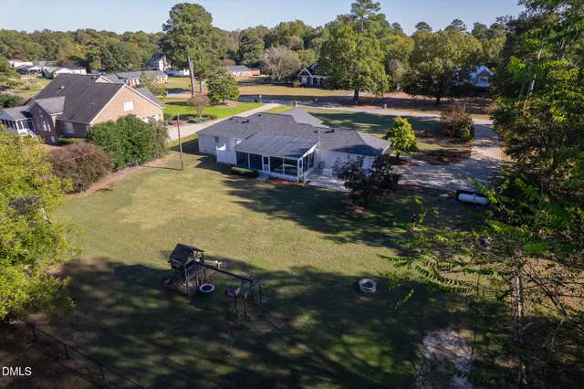 a view of a balcony with wooden floor