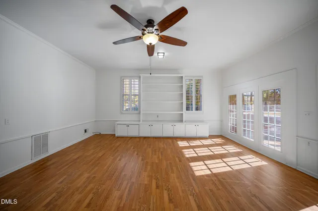 a swimming pool view with a outdoor seating