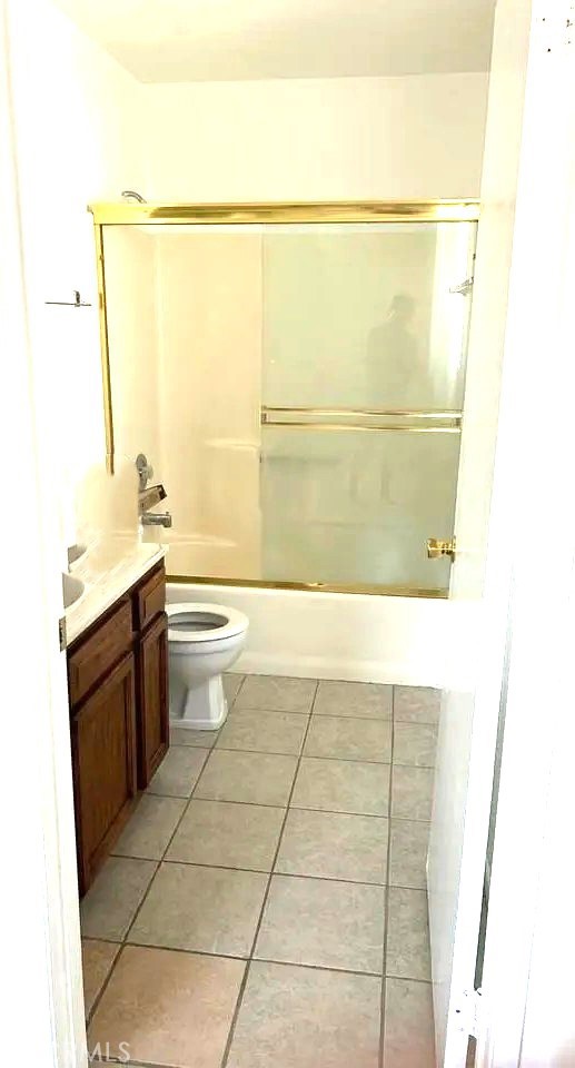16228 Wato Road Apple Valley, CA 92307 - Photo 11 of 17 a bathroom with a sink a toilet and shower
