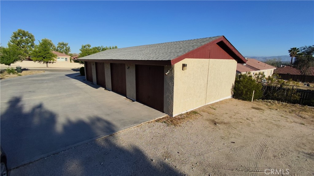 16228 Wato Road Apple Valley, CA 92307 - Photo 12 of 17 a backyard of a house