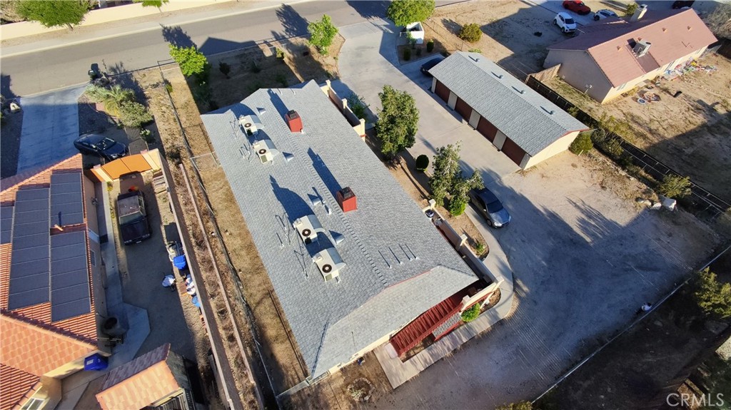 16228 Wato Road Apple Valley, CA 92307 - Photo 15 of 17 an aerial view of residential houses with outdoor space