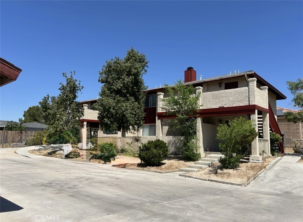 16228 Wato Road Apple Valley, CA 92307 - Photo 2 of 17 a view of a building with a street