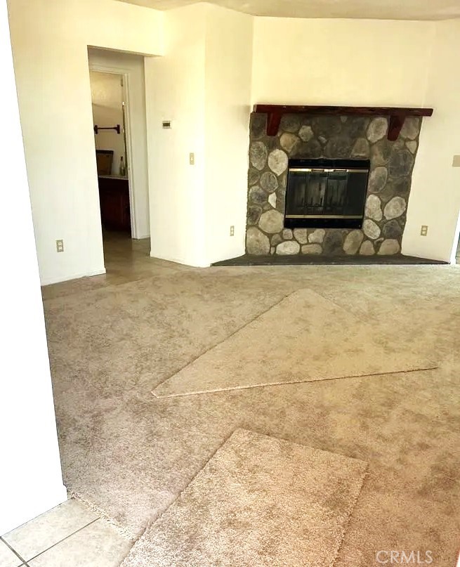 16228 Wato Road Apple Valley, CA 92307 - Photo 6 of 17 a living room with a fireplace