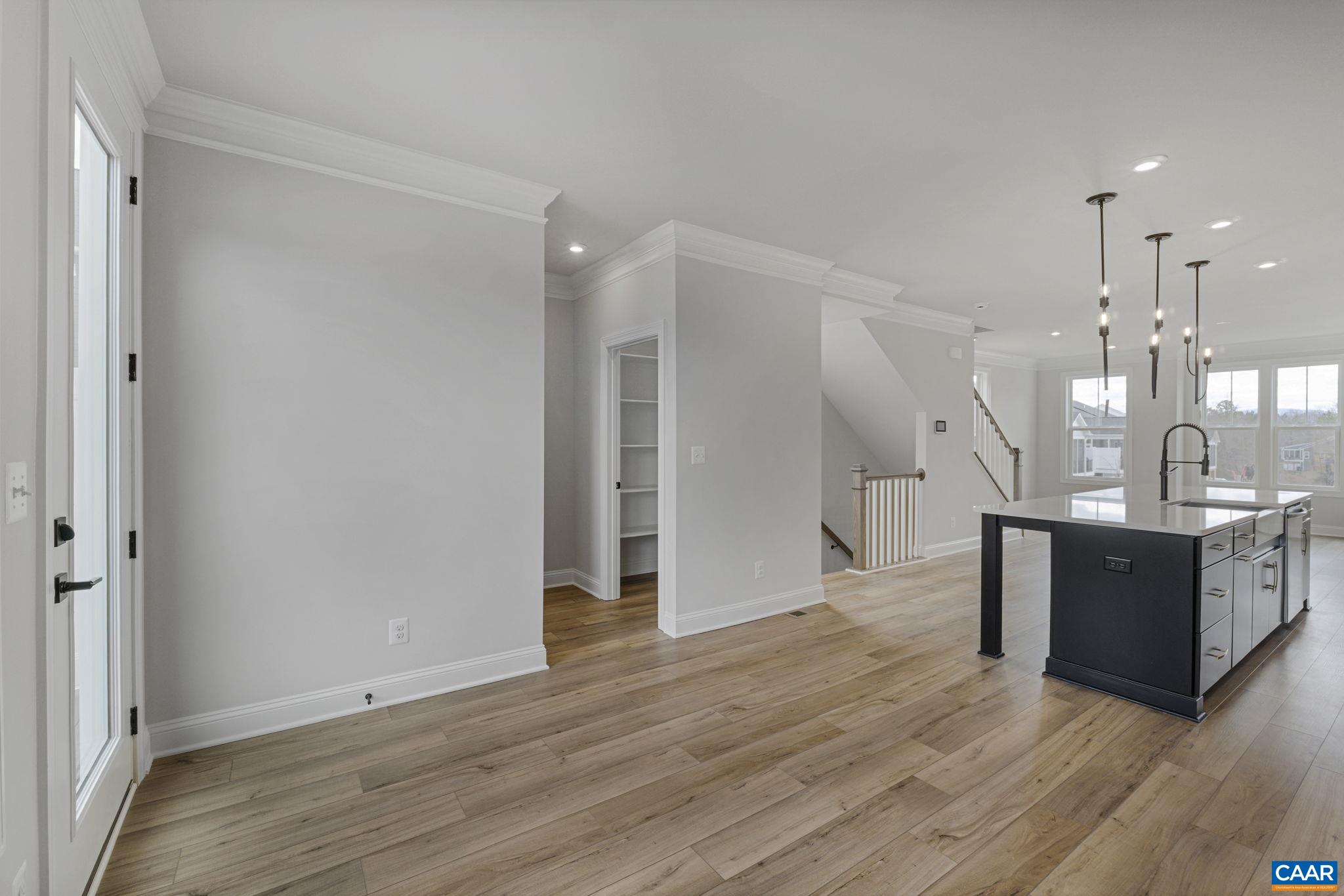 138 Park Ridge Drive Crozet, VA 22932 - Photo 17 of 51 a large room with wooden floor and a sink