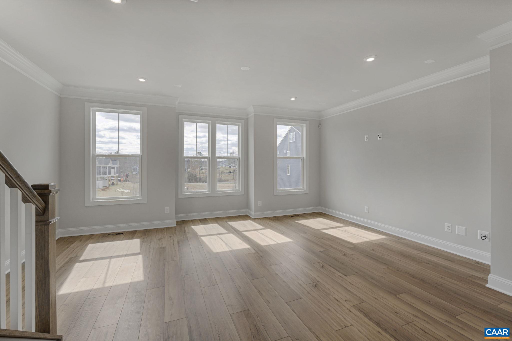 138 Park Ridge Drive Crozet, VA 22932 - Photo 20 of 51 an empty room with wooden floor and windows