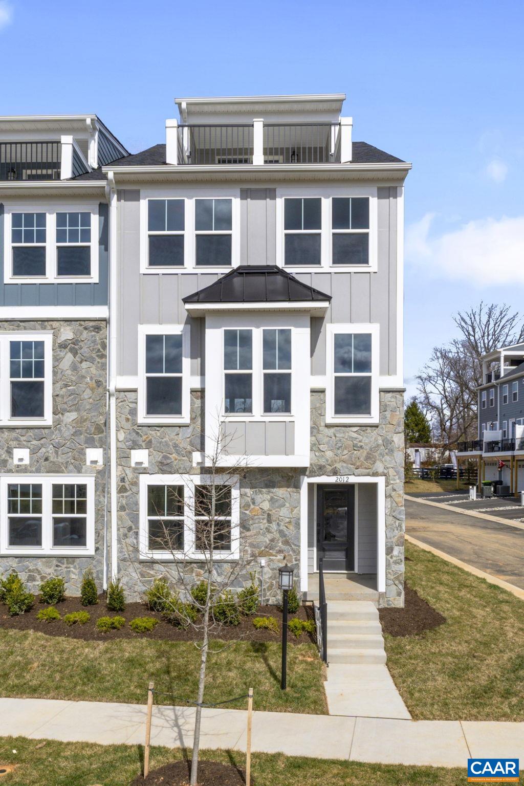 138 Park Ridge Drive Crozet, VA 22932 - Photo 2 of 51 a front view of a building with garden