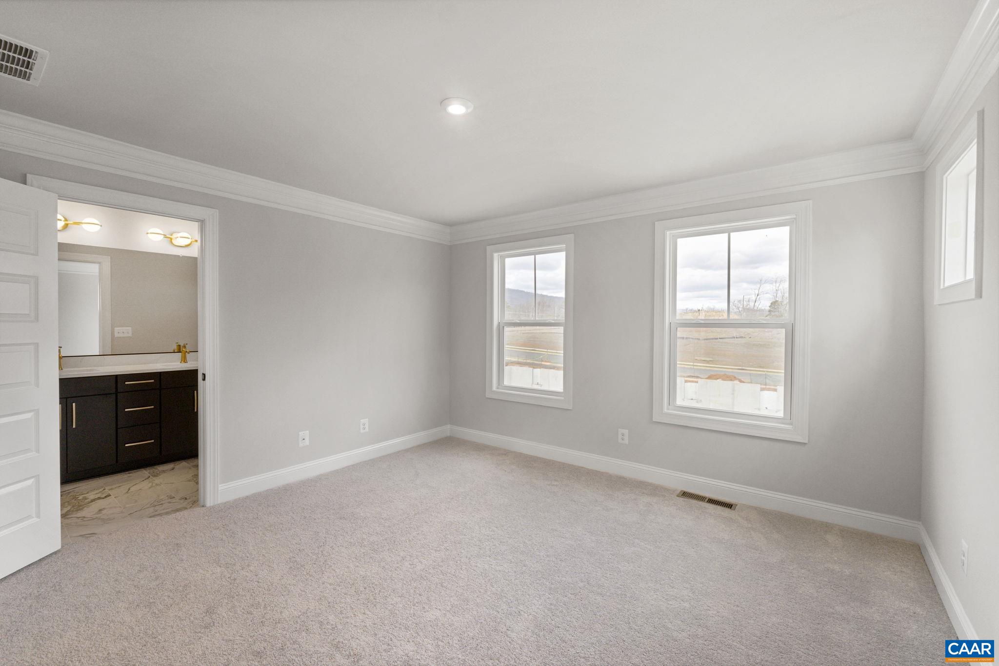 138 Park Ridge Drive Crozet, VA 22932 - Photo 24 of 51 a view of an empty room with a window and a bathroom