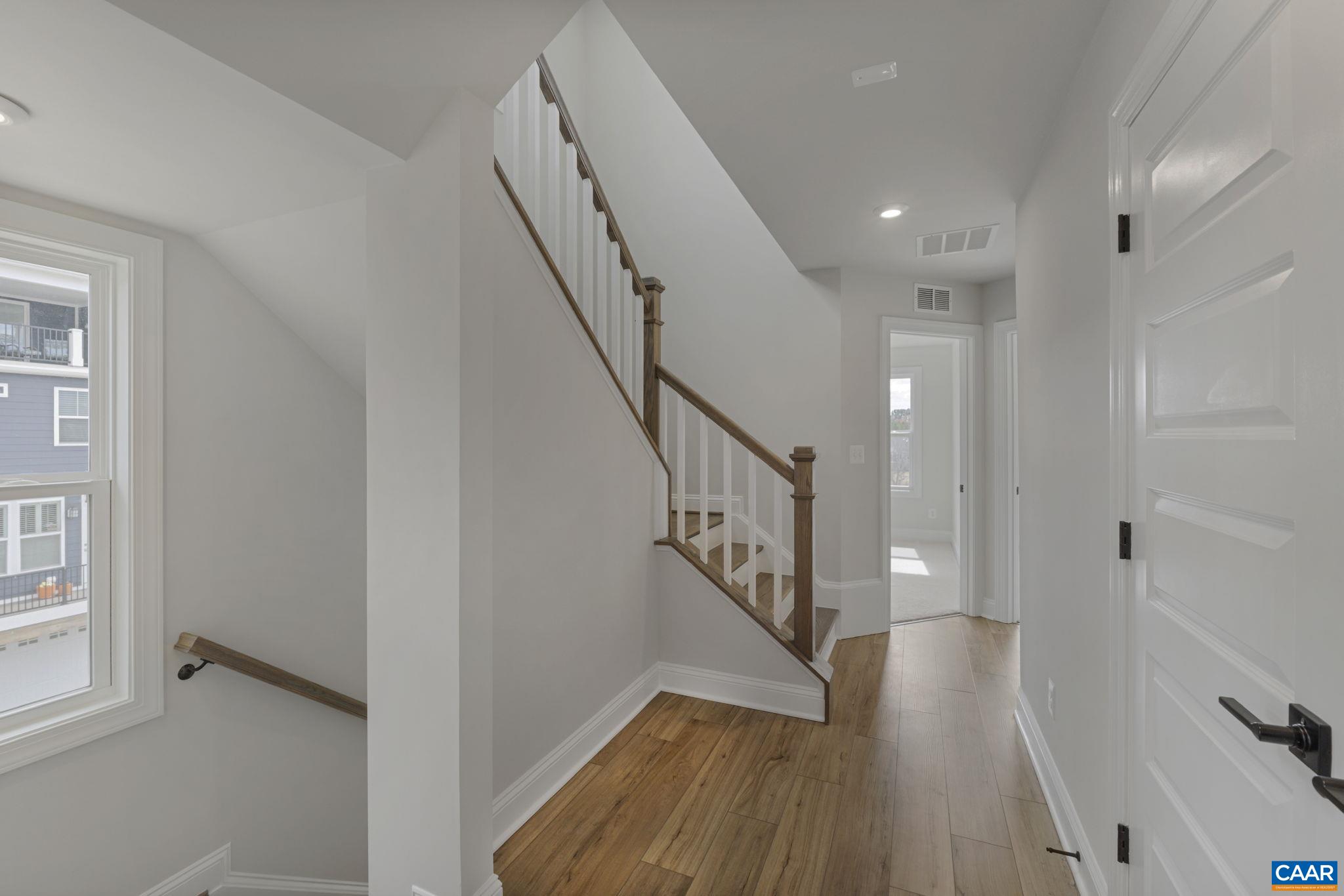 138 Park Ridge Drive Crozet, VA 22932 - Photo 29 of 51 a view of entryway with stairs and wooden floor