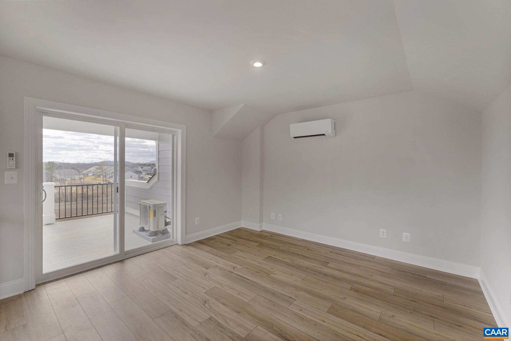 138 Park Ridge Drive Crozet, VA 22932 - Photo 37 of 51 wooden floor in an empty room with a window