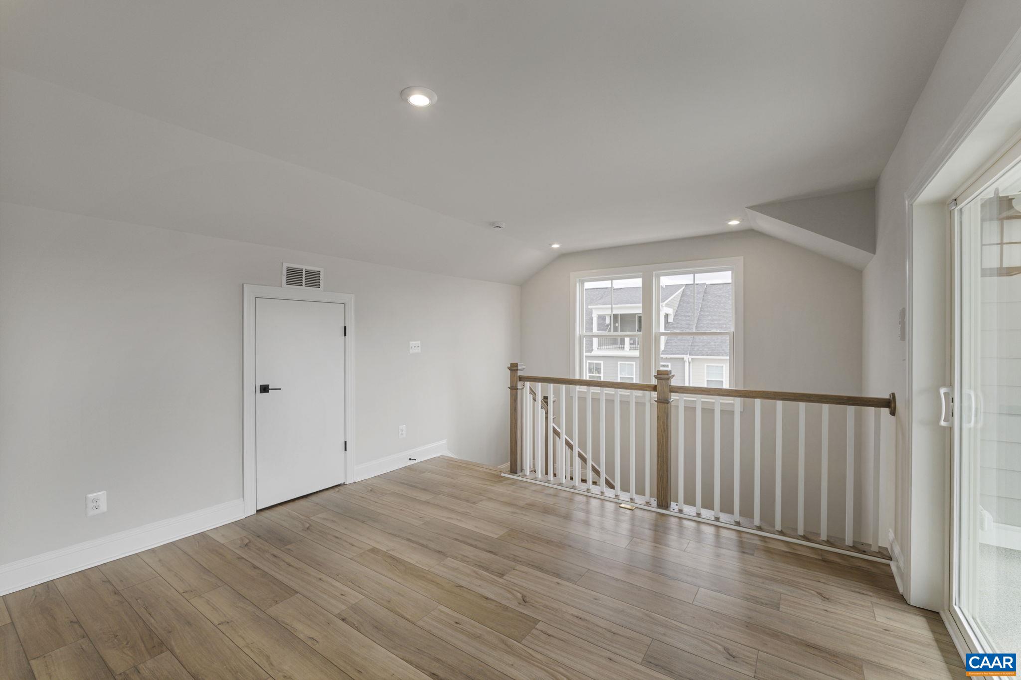 138 Park Ridge Drive Crozet, VA 22932 - Photo 38 of 51 wooden floor in an empty room with a window