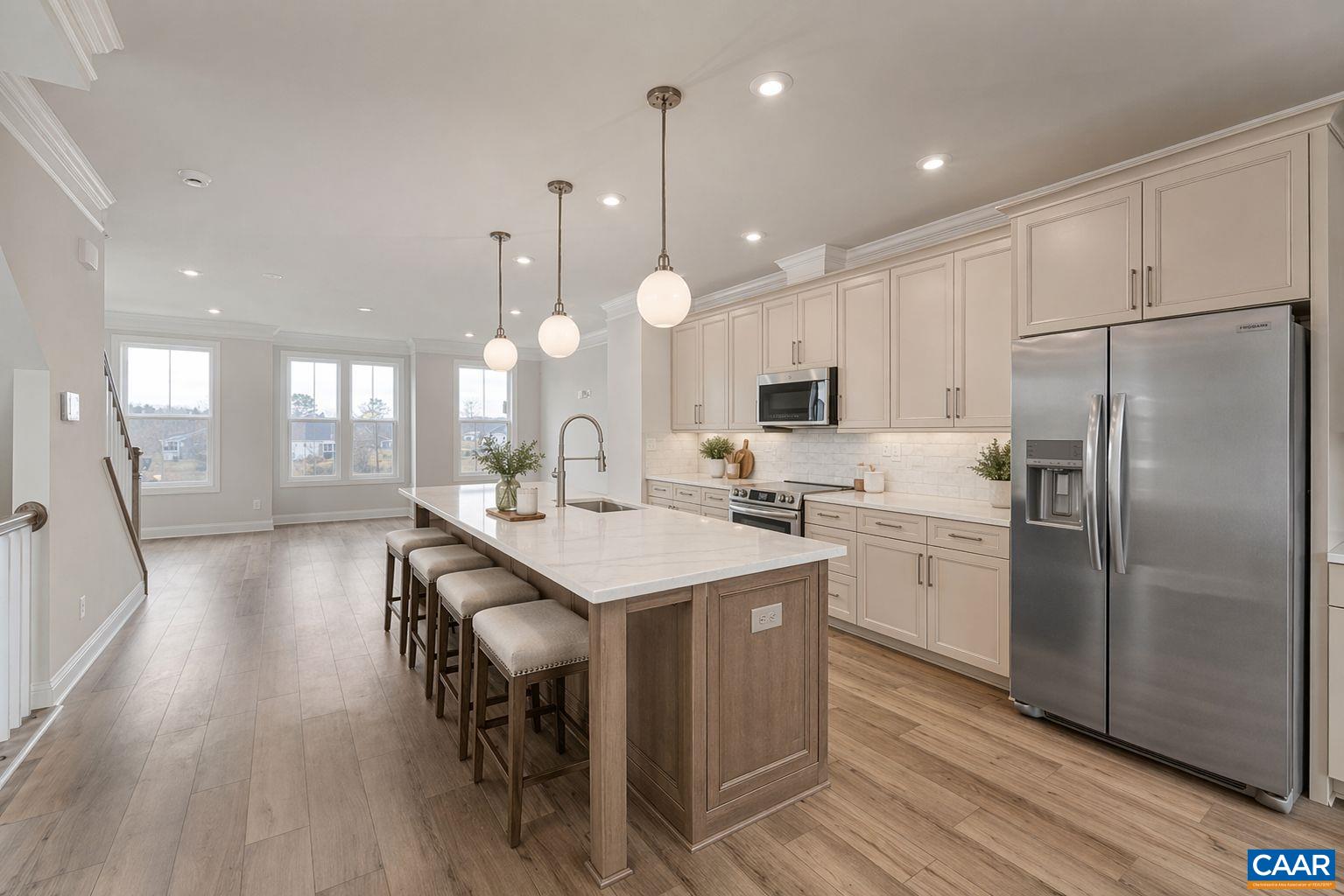 138 Park Ridge Drive Crozet, VA 22932 - Photo 47 of 51 a kitchen with refrigerator a sink and chairs