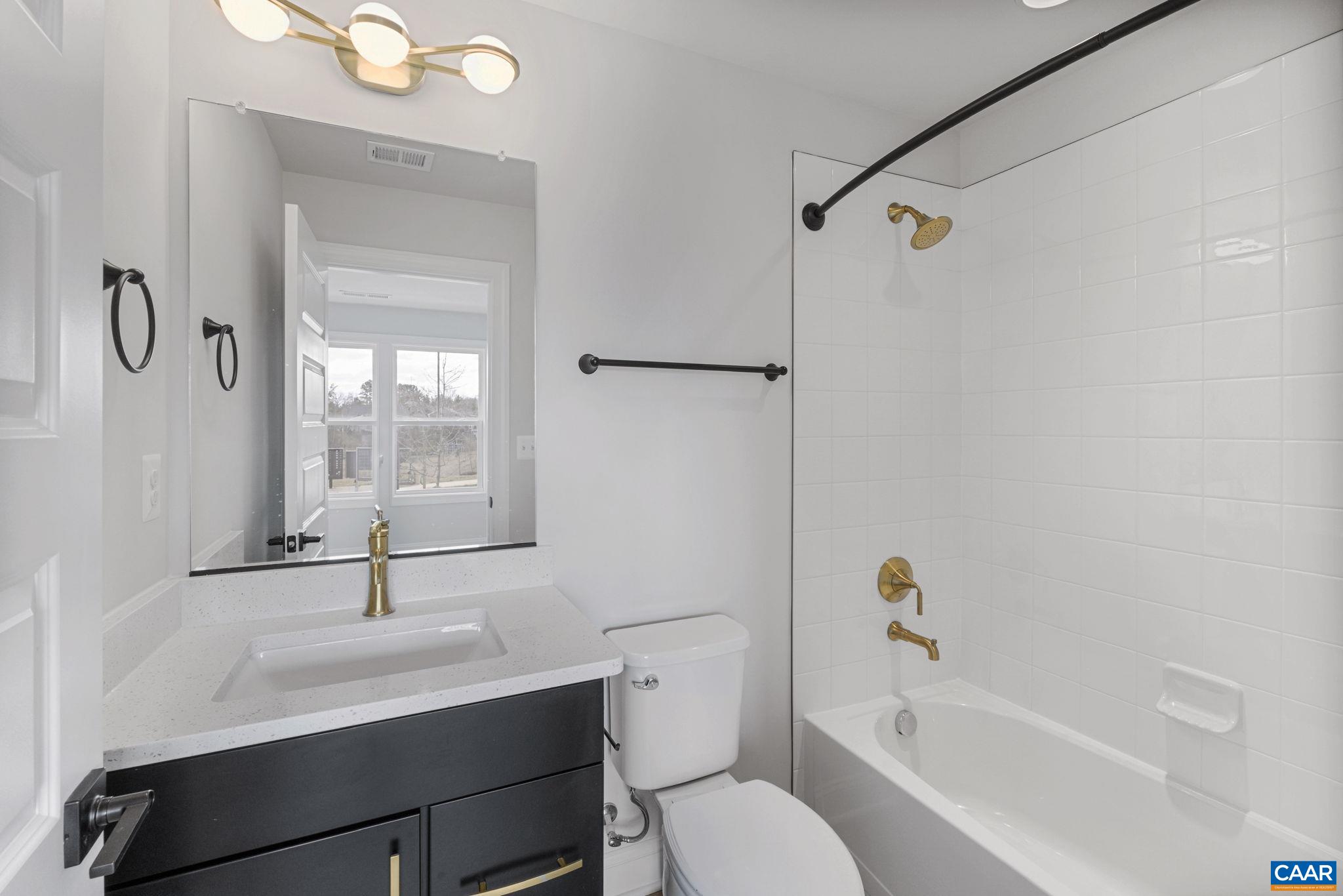 138 Park Ridge Drive Crozet, VA 22932 - Photo 8 of 51 a bathroom with a sink toilet and shower