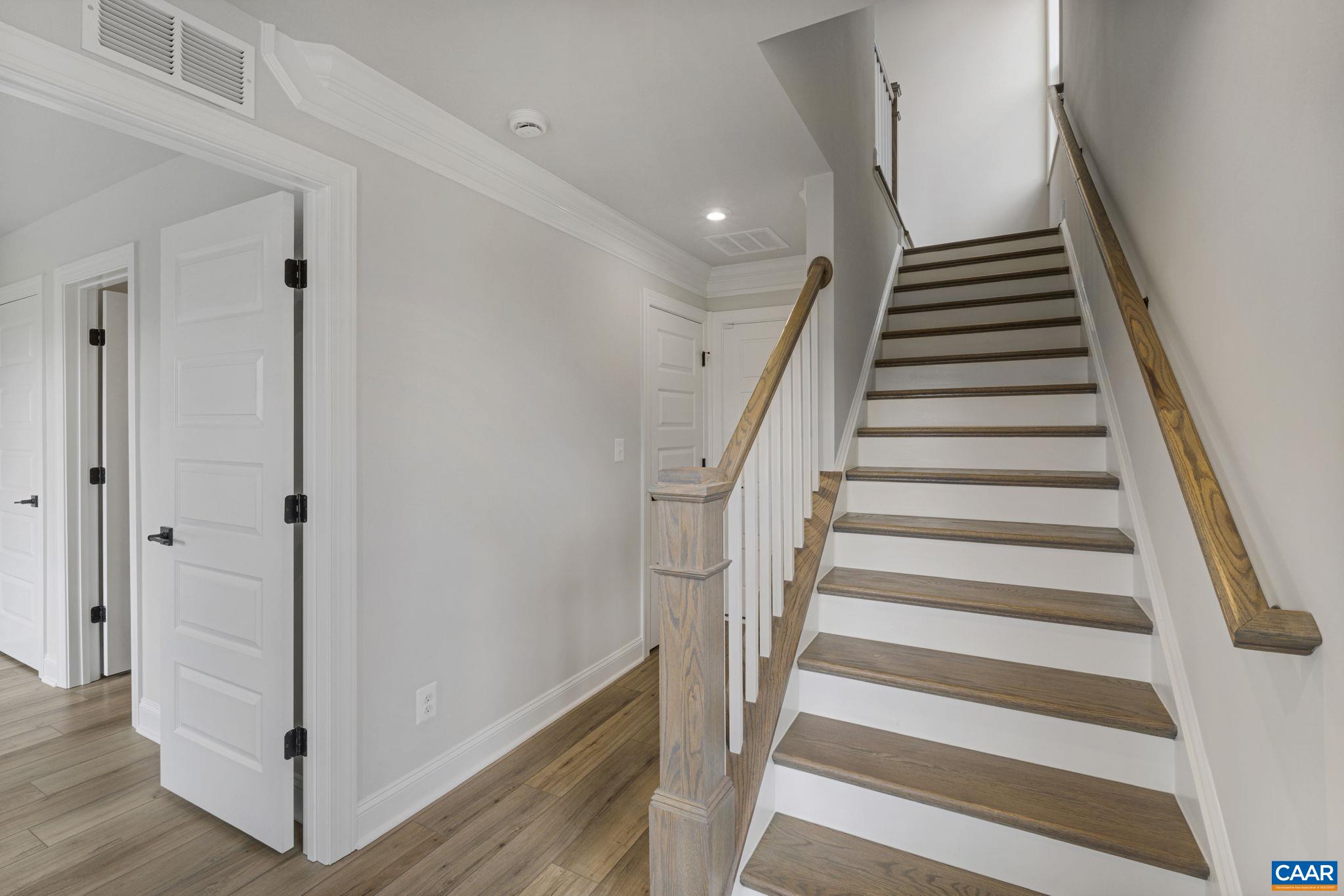 138 Park Ridge Drive Crozet, VA 22932 - Photo 9 of 51 a view of entryway and hall with wooden floor