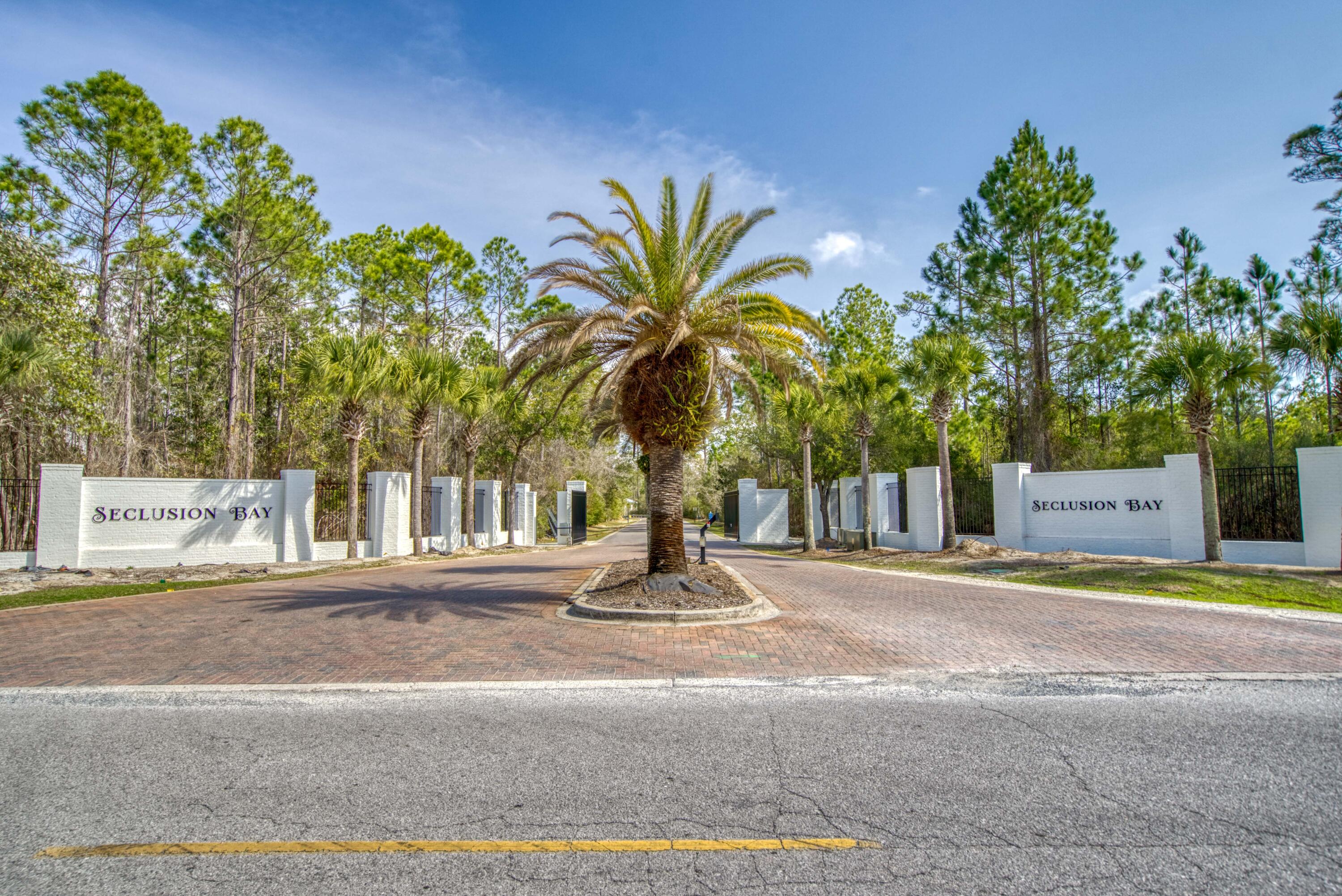 Lot 46 Seclusion Way Santa Rosa Beach, FL 32459 - Photo 5 of 6 a view of a building with a street