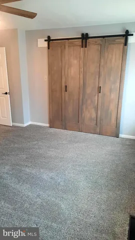 a view of a closet in a room