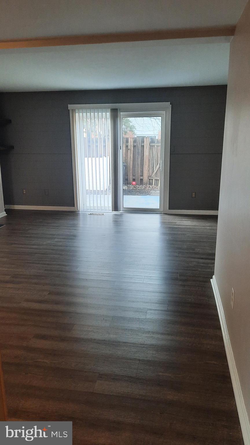 702 Allenview Drive Mechanicsburg, PA 17055 - Photo 6 of 17 wooden floor in an empty room with a window