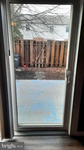 a view of a living room and a window
