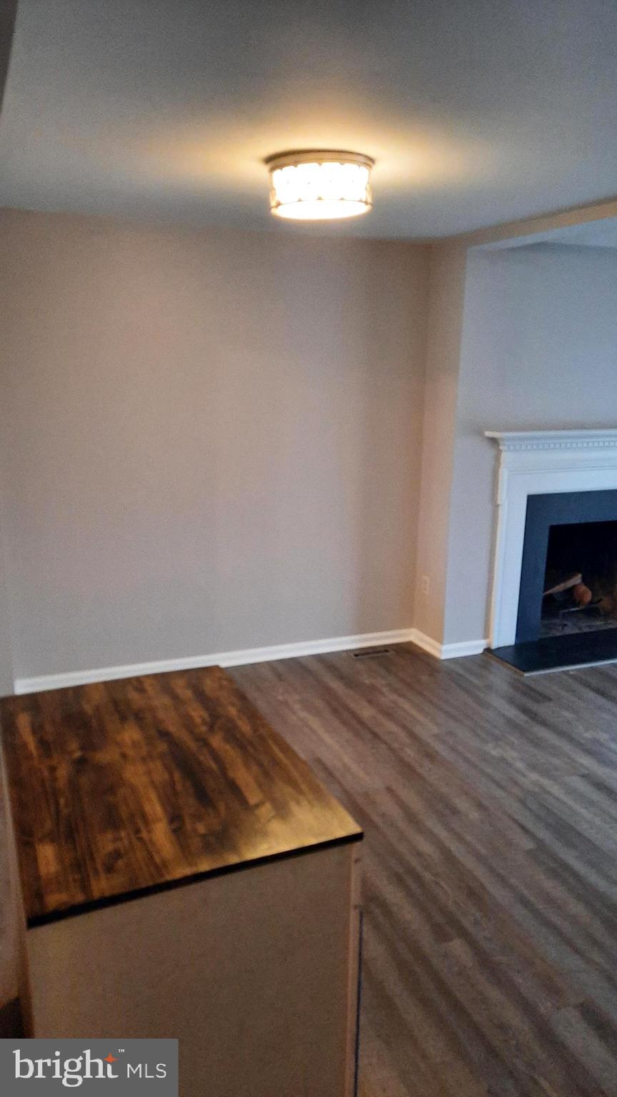 702 Allenview Drive Mechanicsburg, PA 17055 - Photo 10 of 17 a view of empty room with window and fireplace