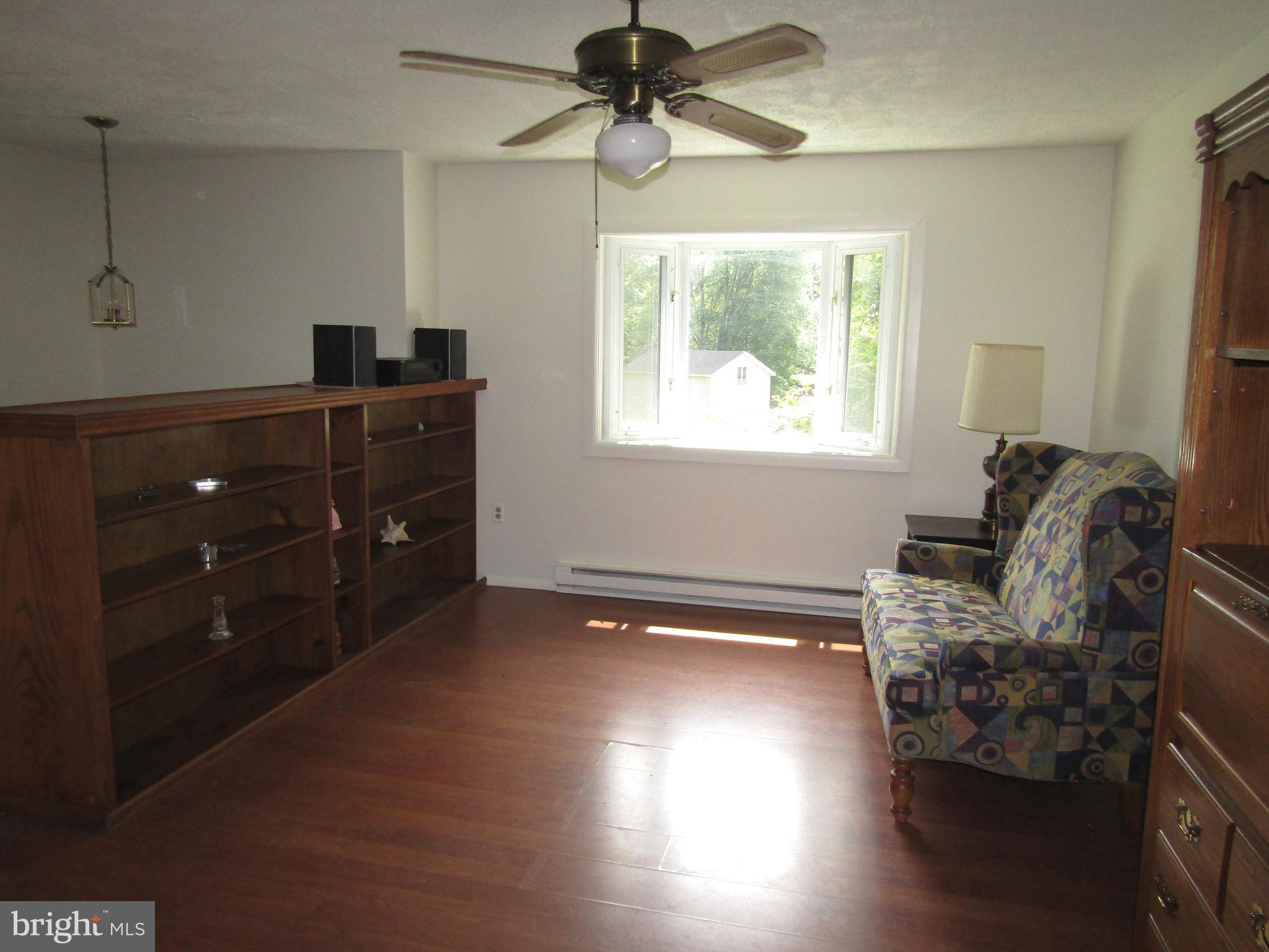 2 Reds Lane West Grove, PA 19390 - Photo 3 of 32 Living room with built-ins, laminate flooring