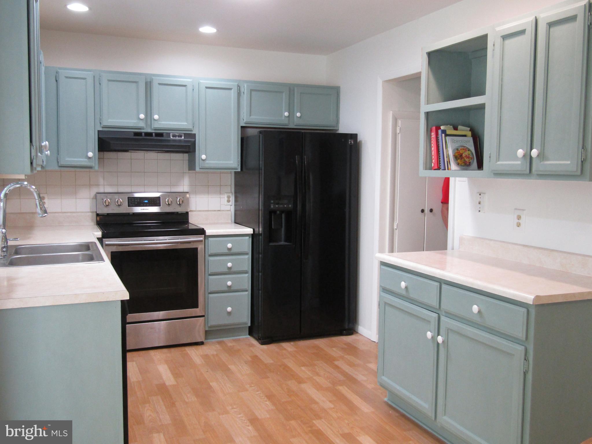 2 Reds Lane West Grove, PA 19390 - Photo 8 of 32 Microwave & cookbook shelving over prep counter