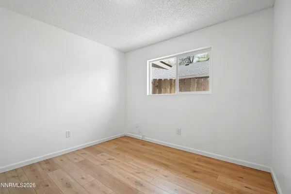 an empty room with a workspace