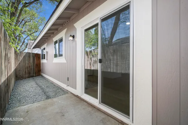 a view of a house with a glass door