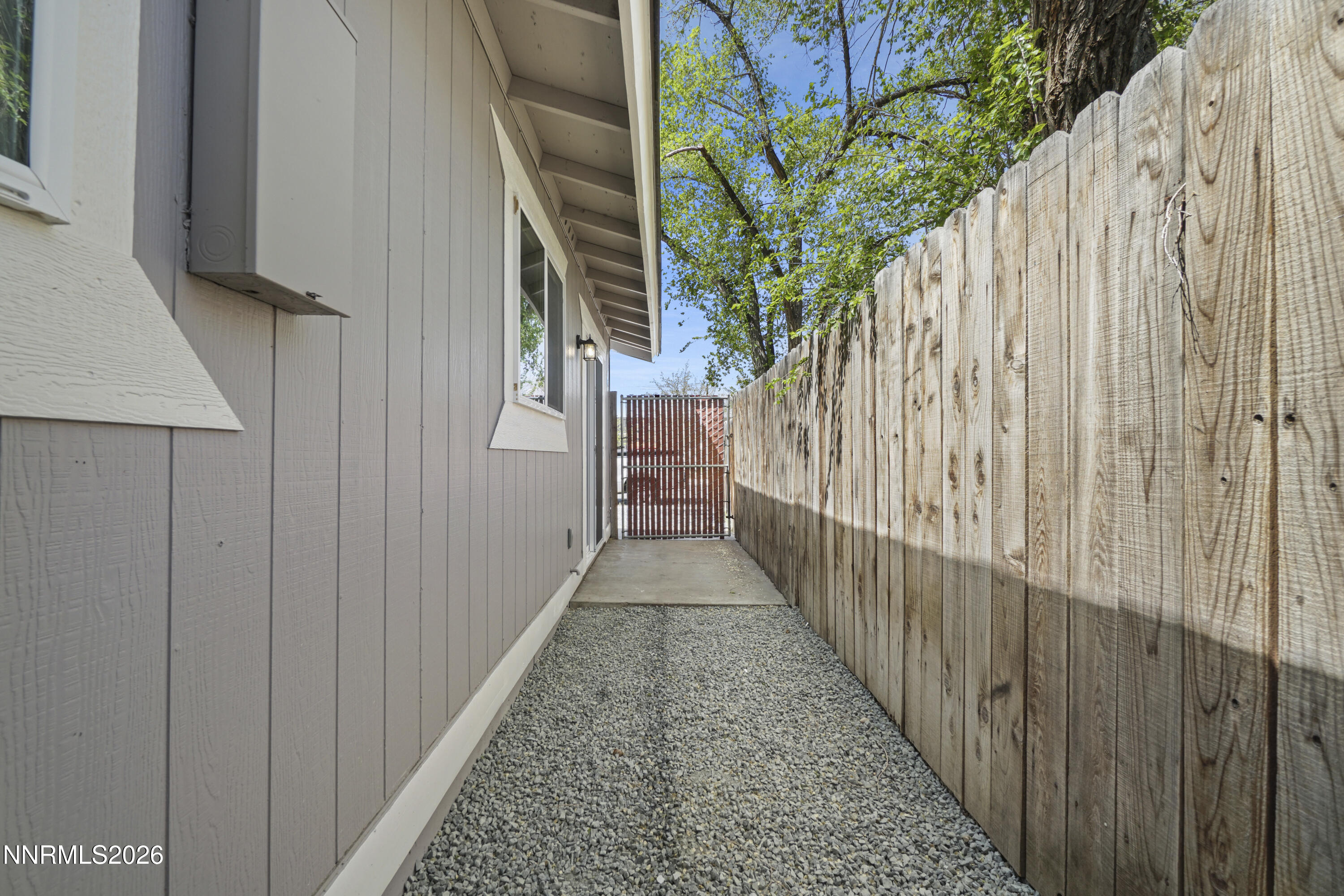 535 Churchill Street Fallon, NV 89406 - Photo 16 of 19 a view of a pathway of a house with wooden floor
