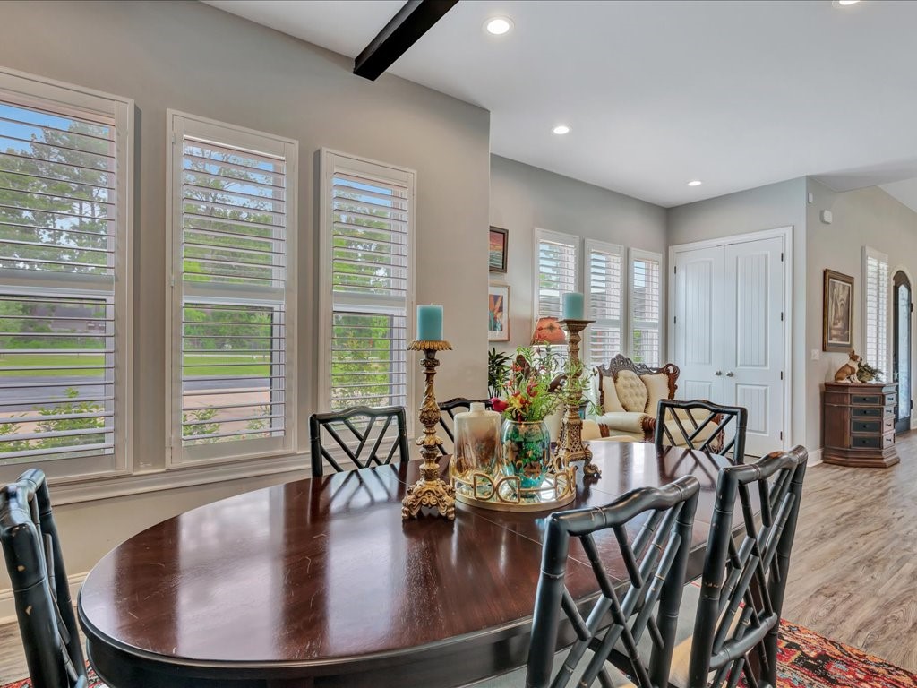 104 Wheeler Road Lufkin, TX 75901 - Photo 14 of 45 a dining room with furniture and wooden floor