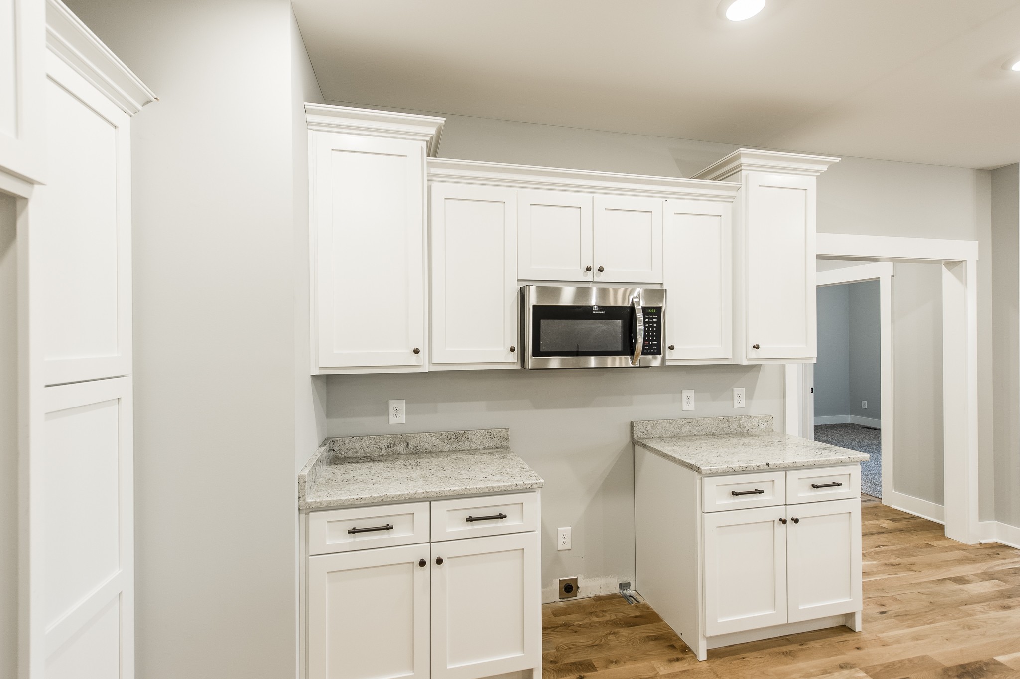 511 Clearview Road Cottontown, TN 37048 - Photo 19 of 41 a kitchen with white cabinets and white appliances