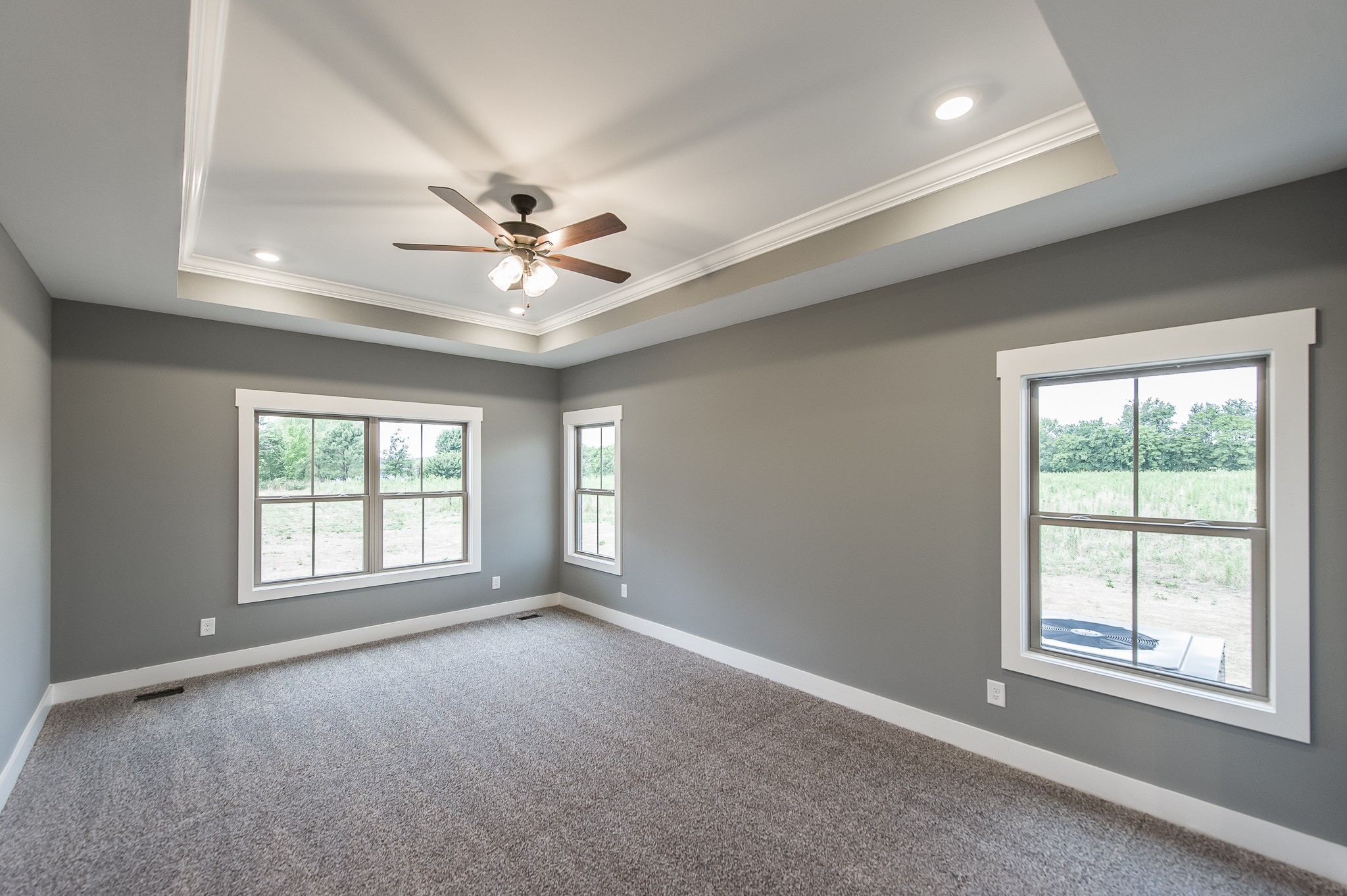 511 Clearview Road Cottontown, TN 37048 - Photo 21 of 41 an empty room with windows and ceiling fan
