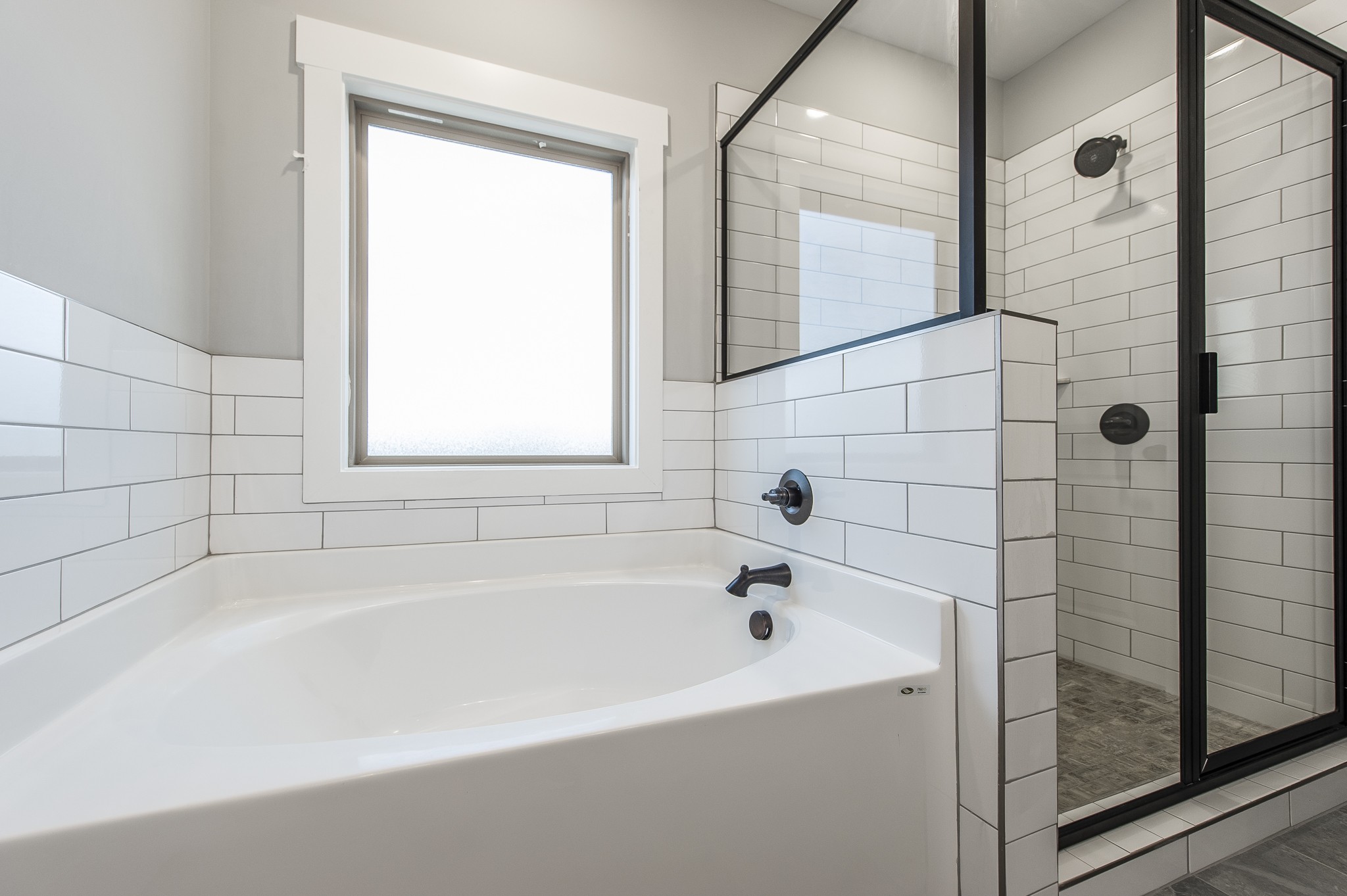 511 Clearview Road Cottontown, TN 37048 - Photo 23 of 41 a white bath tub sitting next to a shower