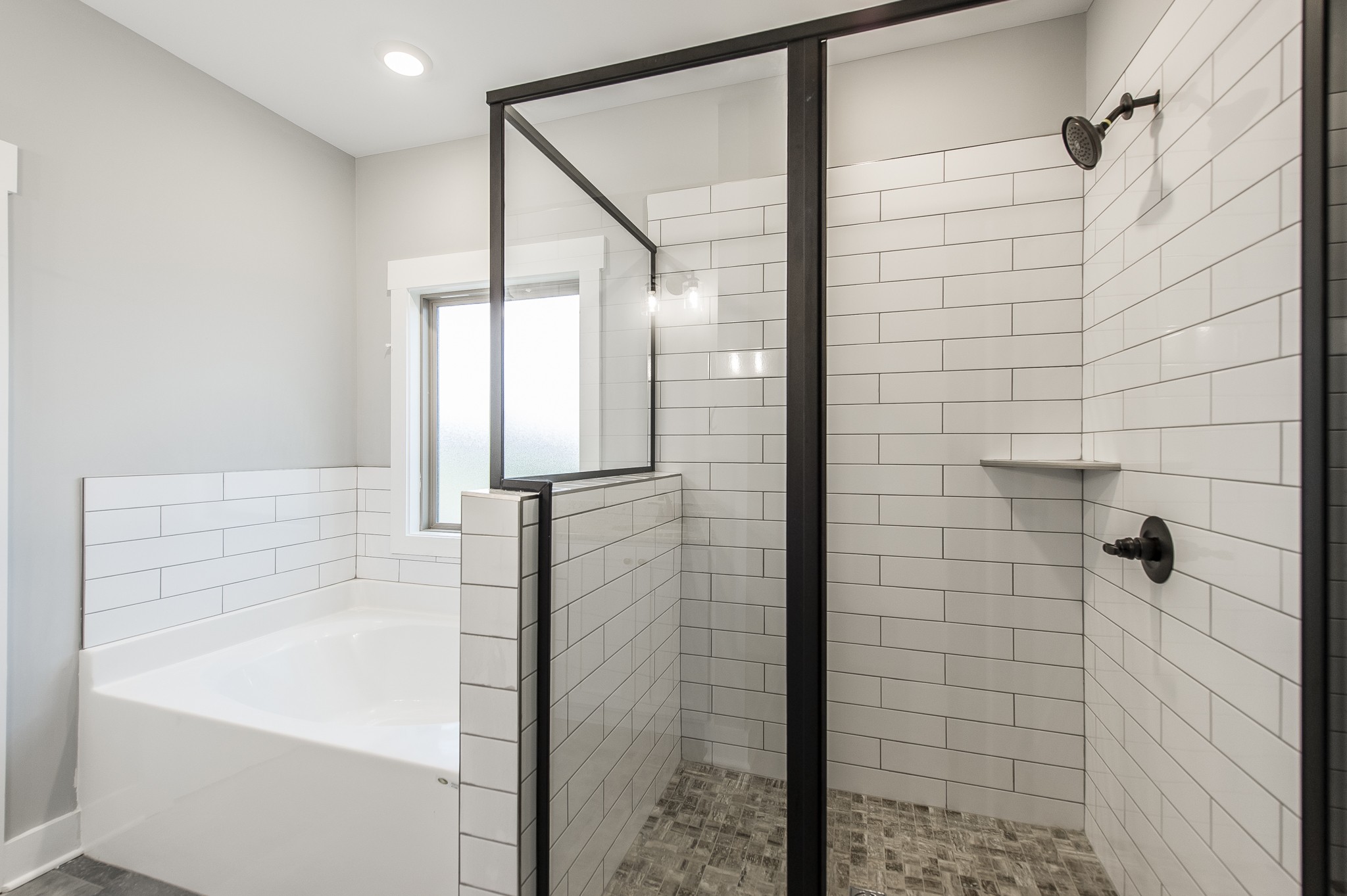 511 Clearview Road Cottontown, TN 37048 - Photo 24 of 41 a bathroom with a bathtub and shower